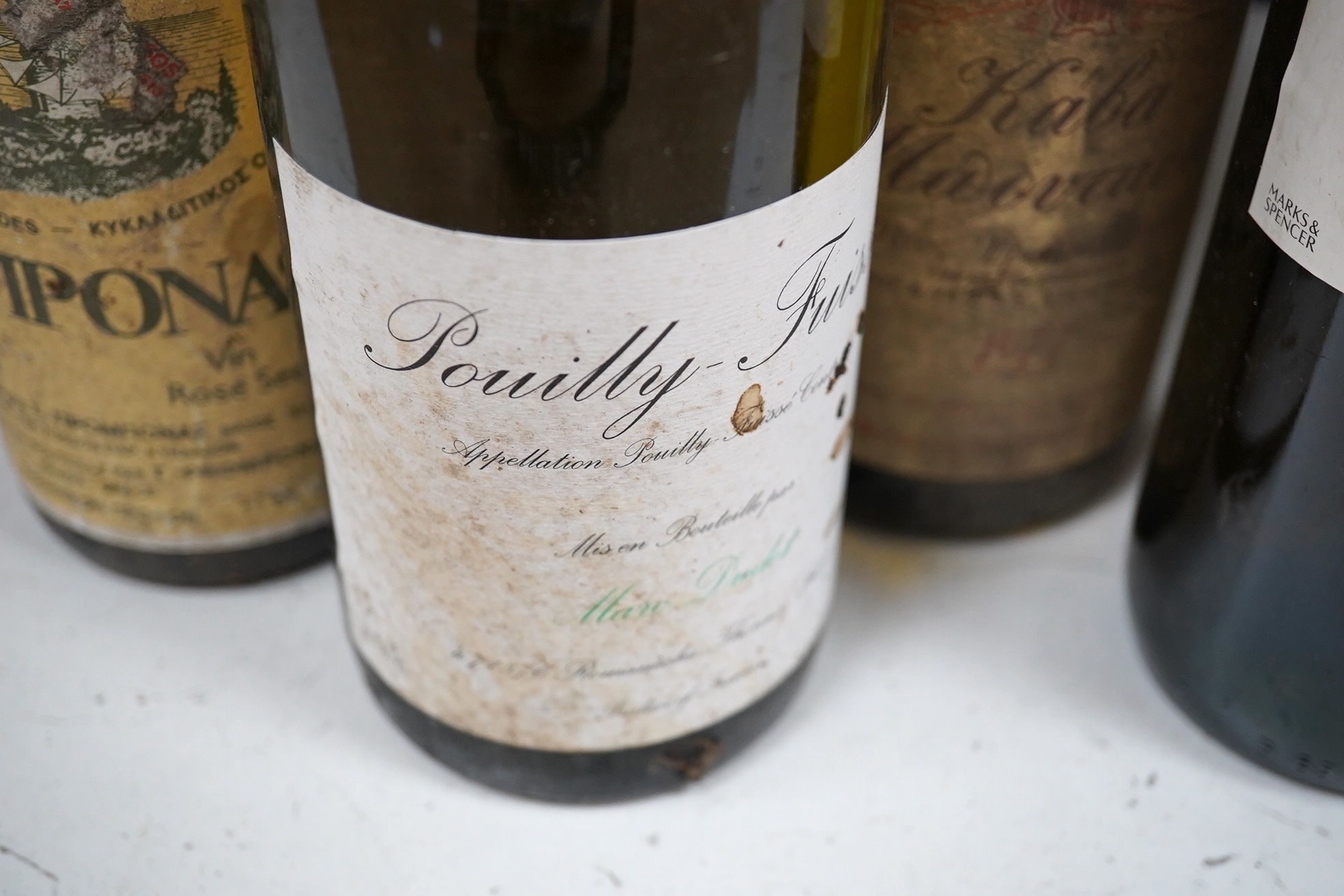 Twelve bottles of Greek and French wines to include Pouilly Fuisse 2009 and Gascogne 2010. Condition - unknown storage